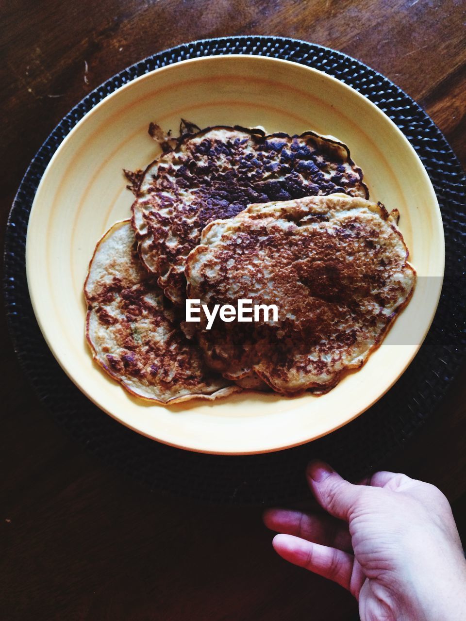 High angle view of pancakes in plate on table