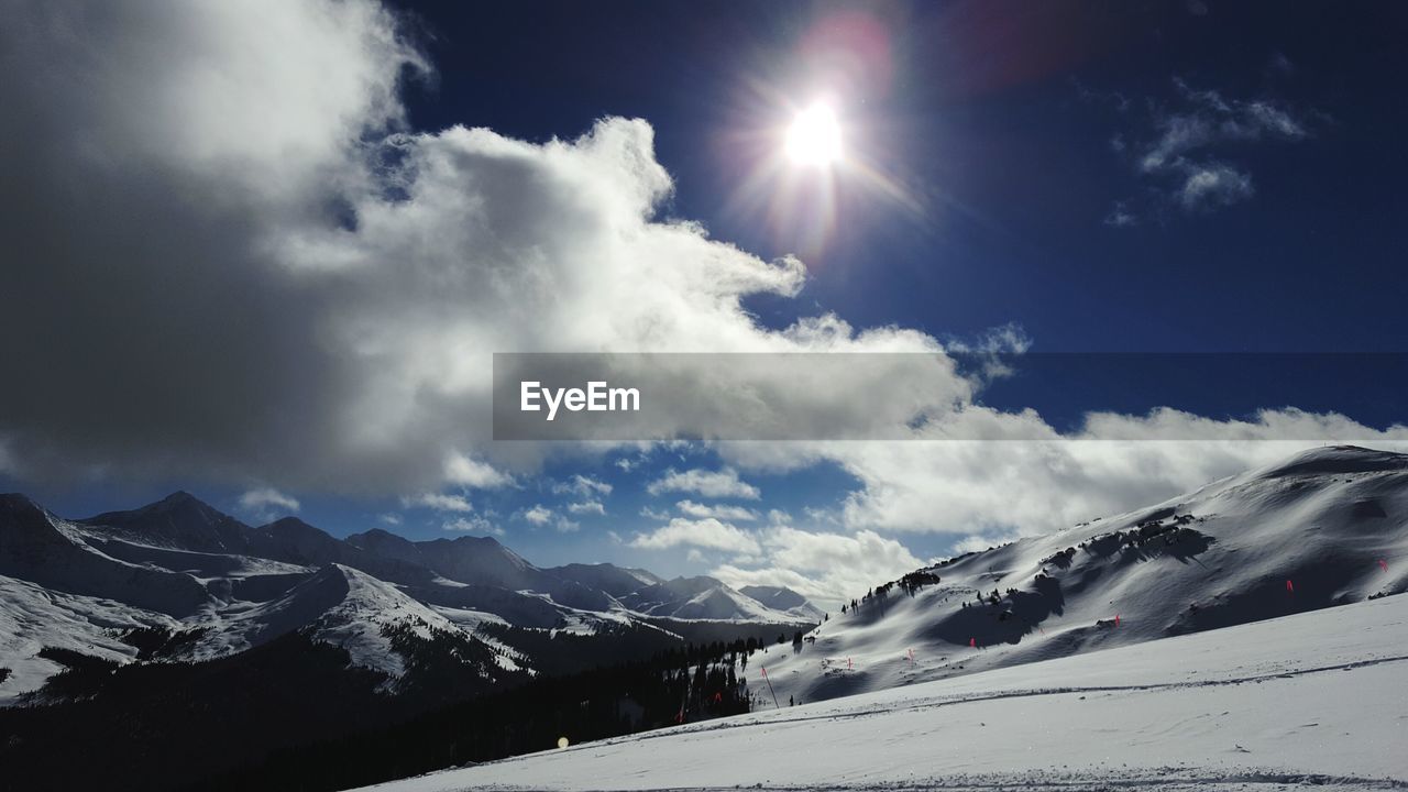 SNOWCAPPED MOUNTAINS AGAINST SKY