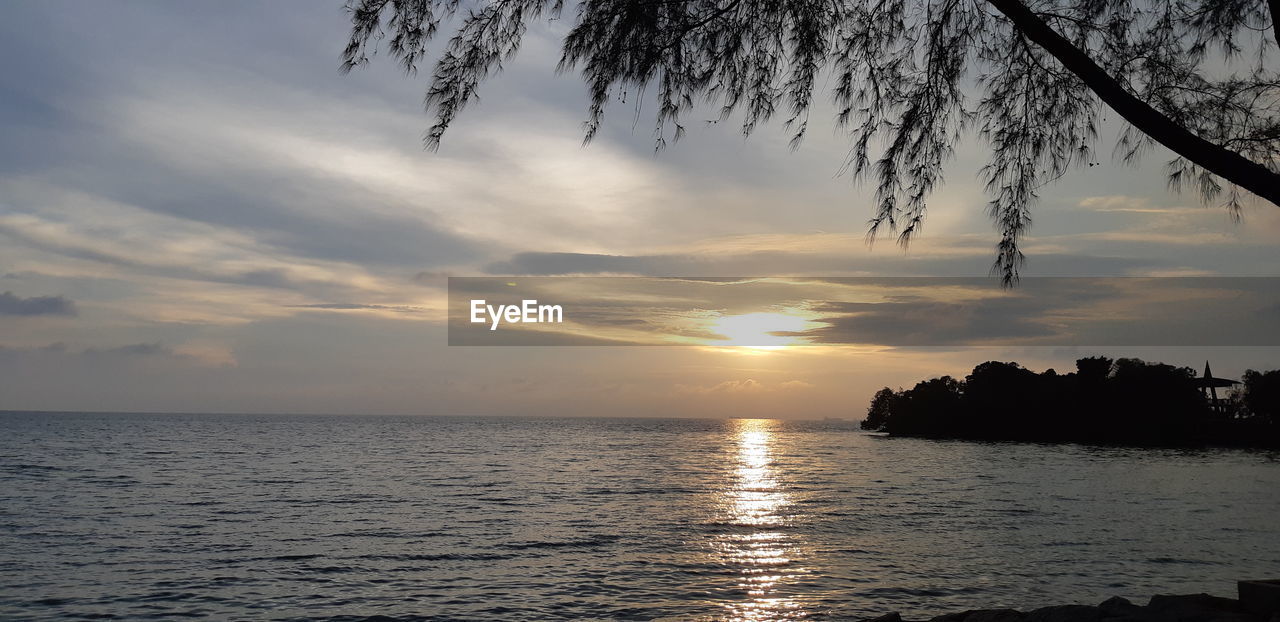 SCENIC VIEW OF SEA DURING SUNSET