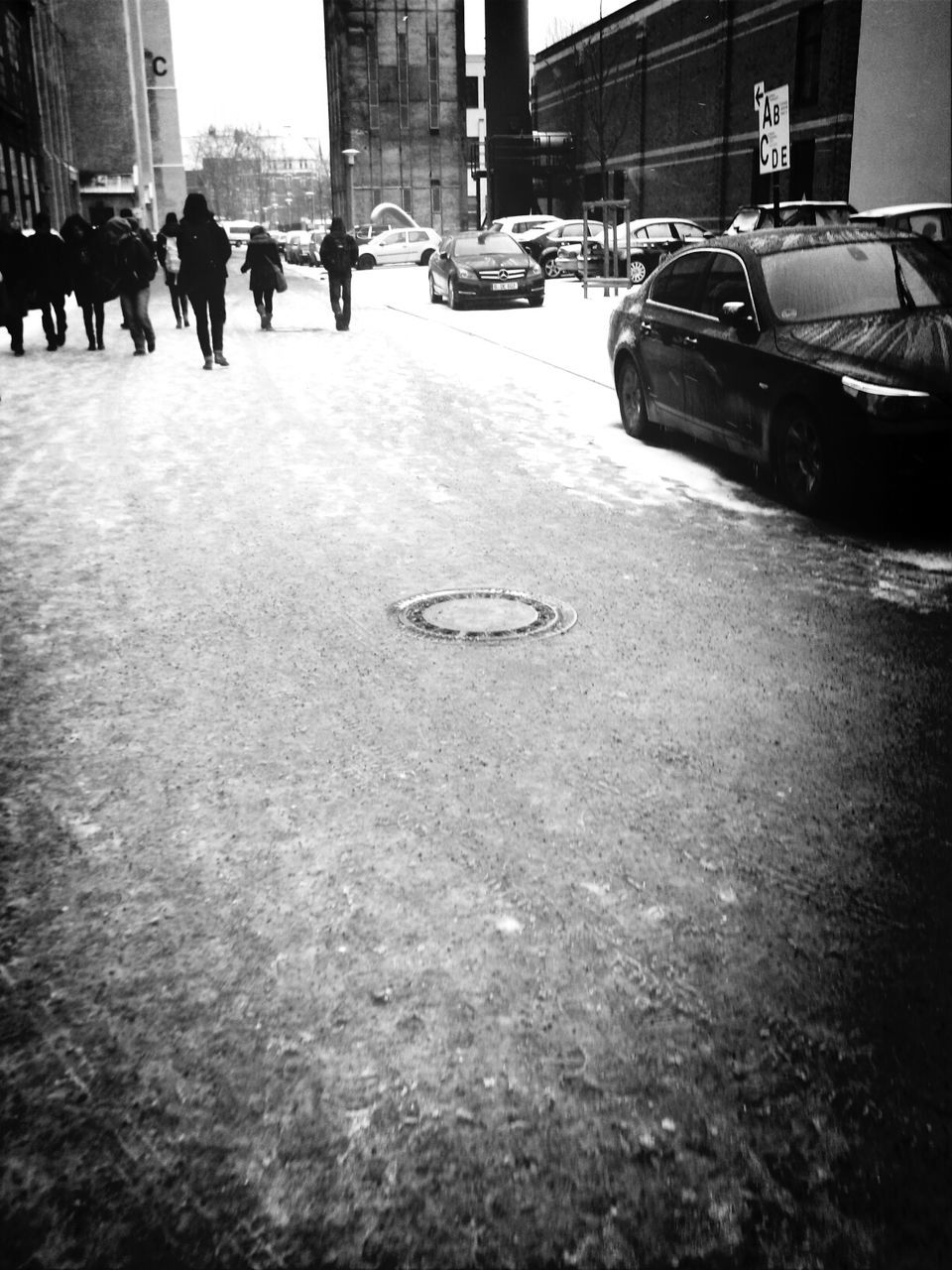 PEOPLE WALKING ON CITY STREET