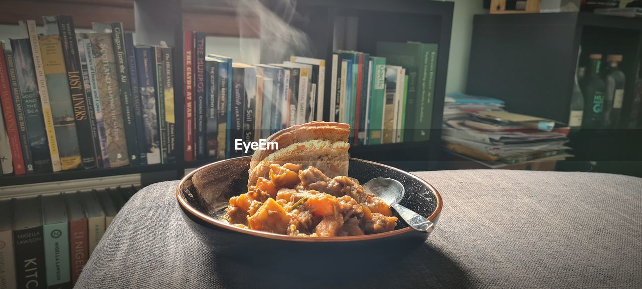 CLOSE-UP OF FOOD ON TABLE