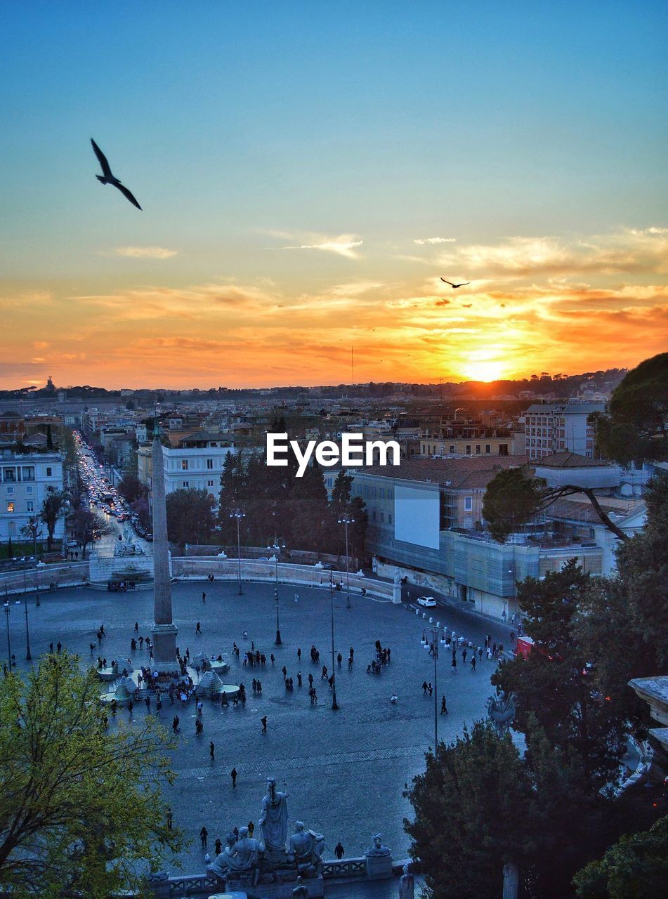 High angle view of city during sunset