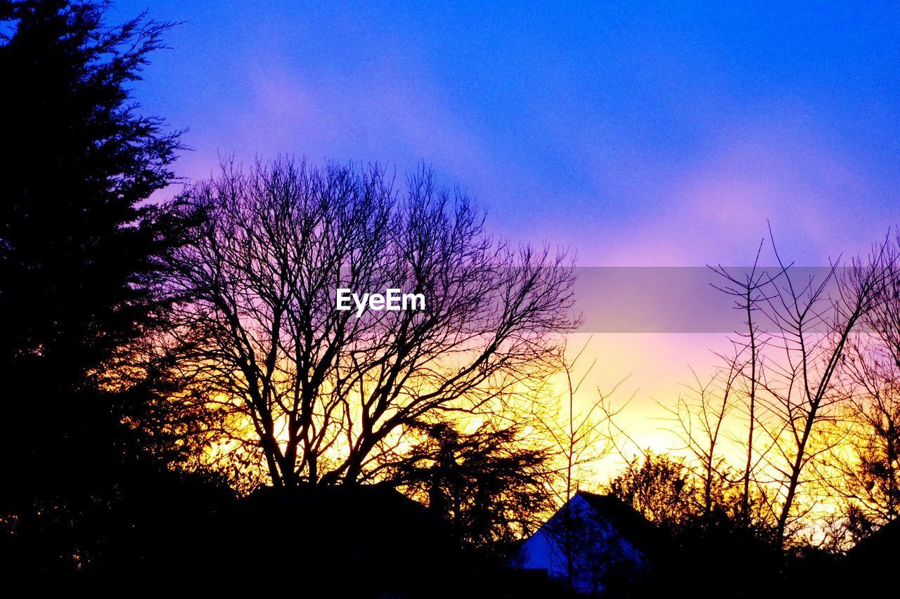 SCENIC VIEW OF LANDSCAPE AGAINST SKY AT SUNSET