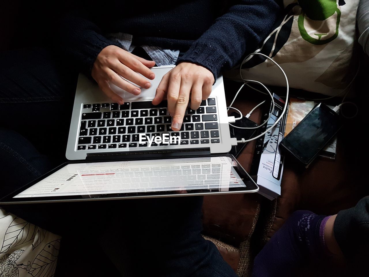 High angle view of person using laptop