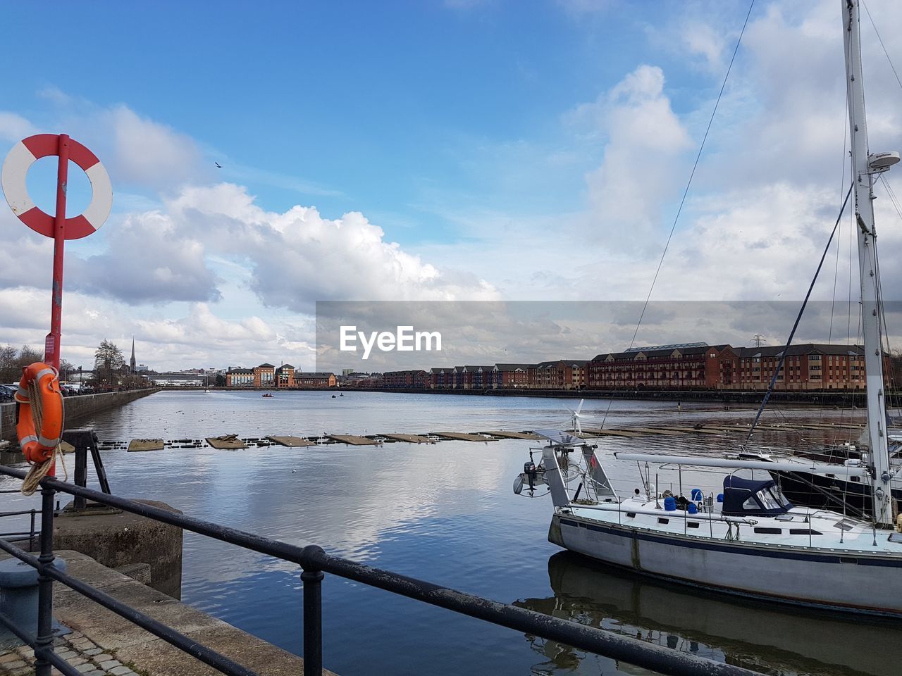 HARBOR BY RIVER AGAINST SKY