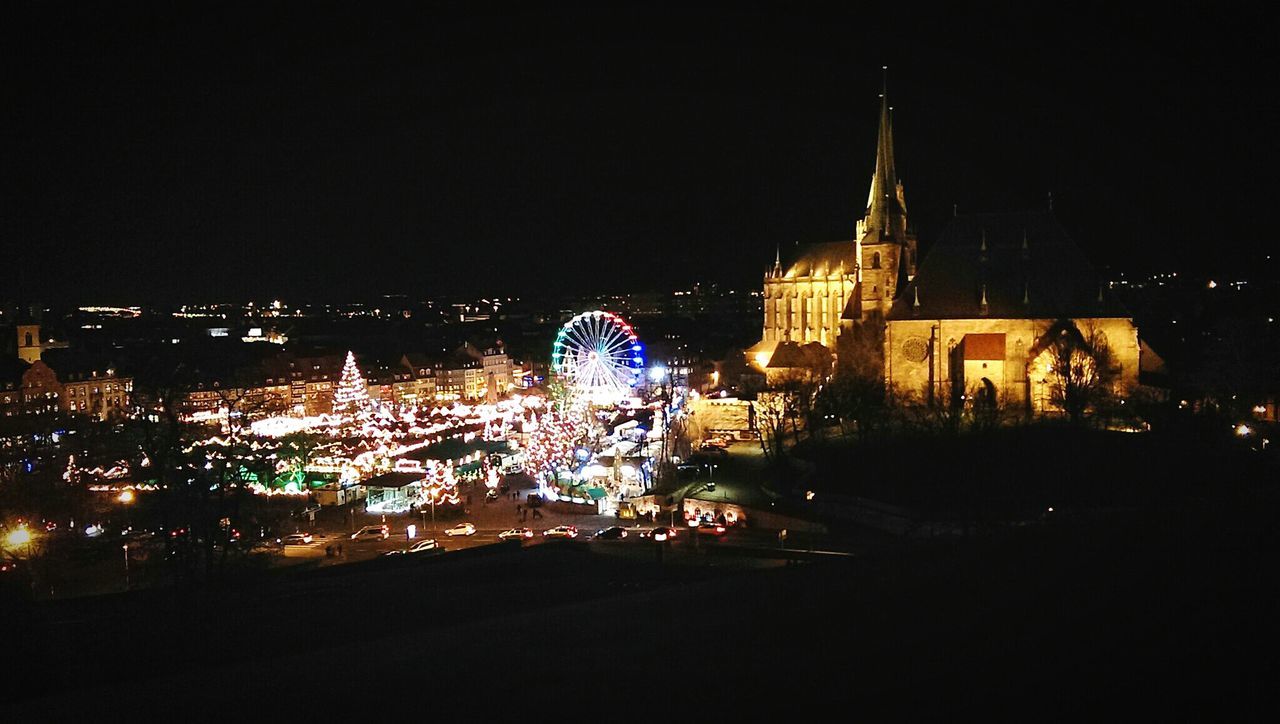 VIEW OF ILLUMINATED CITYSCAPE