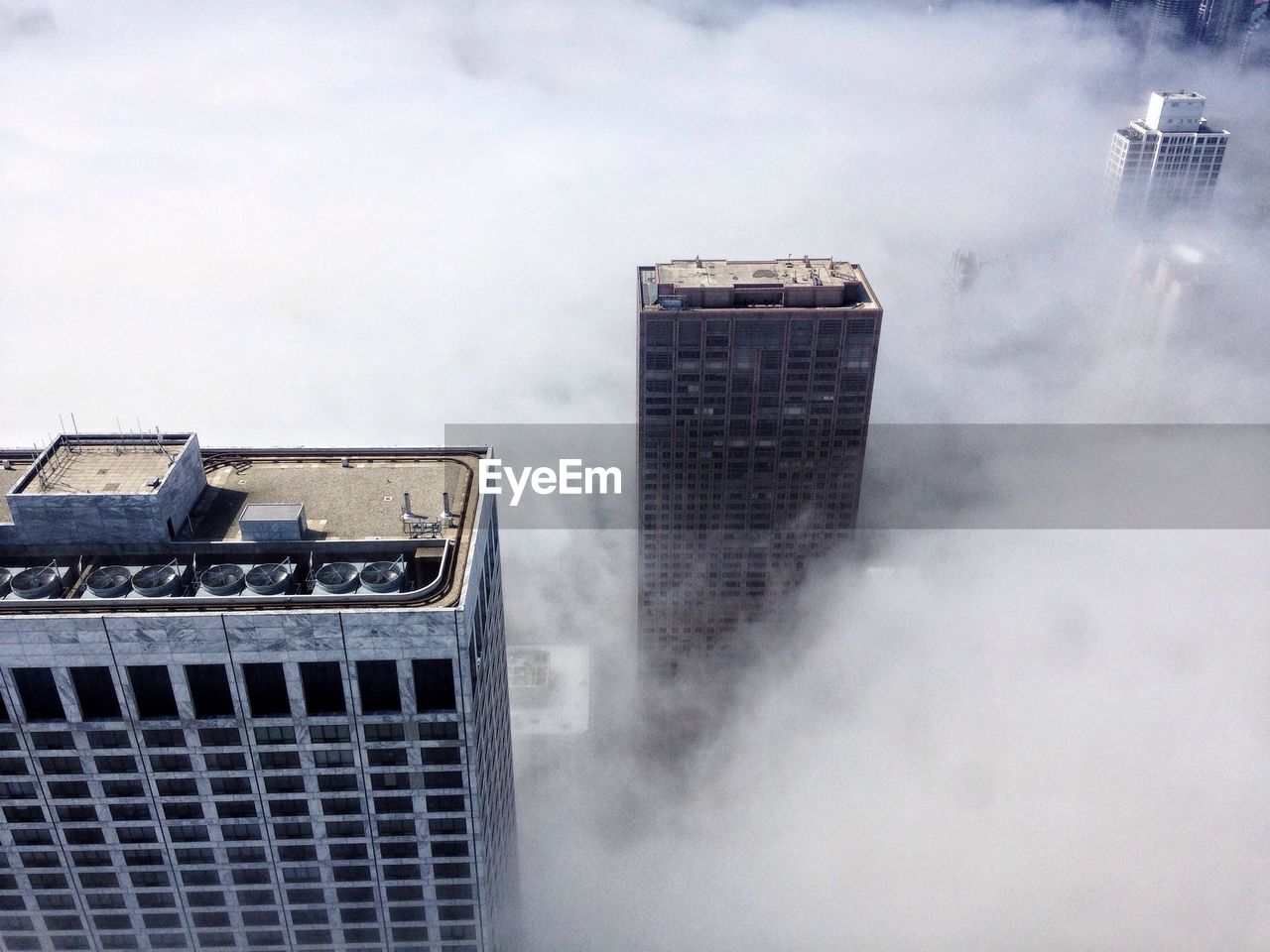 High angle view of fog covering skyscrapers