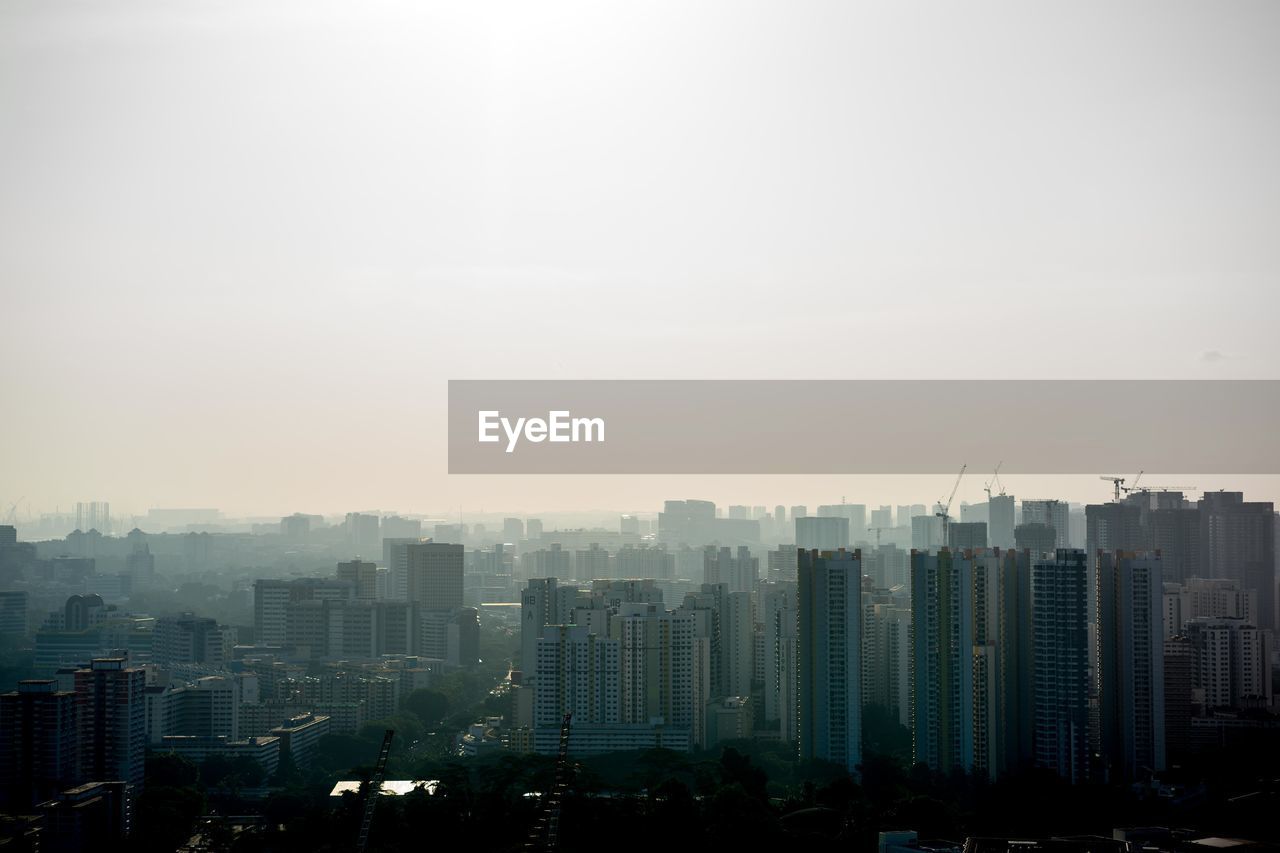 Cityscape against sky during sunset