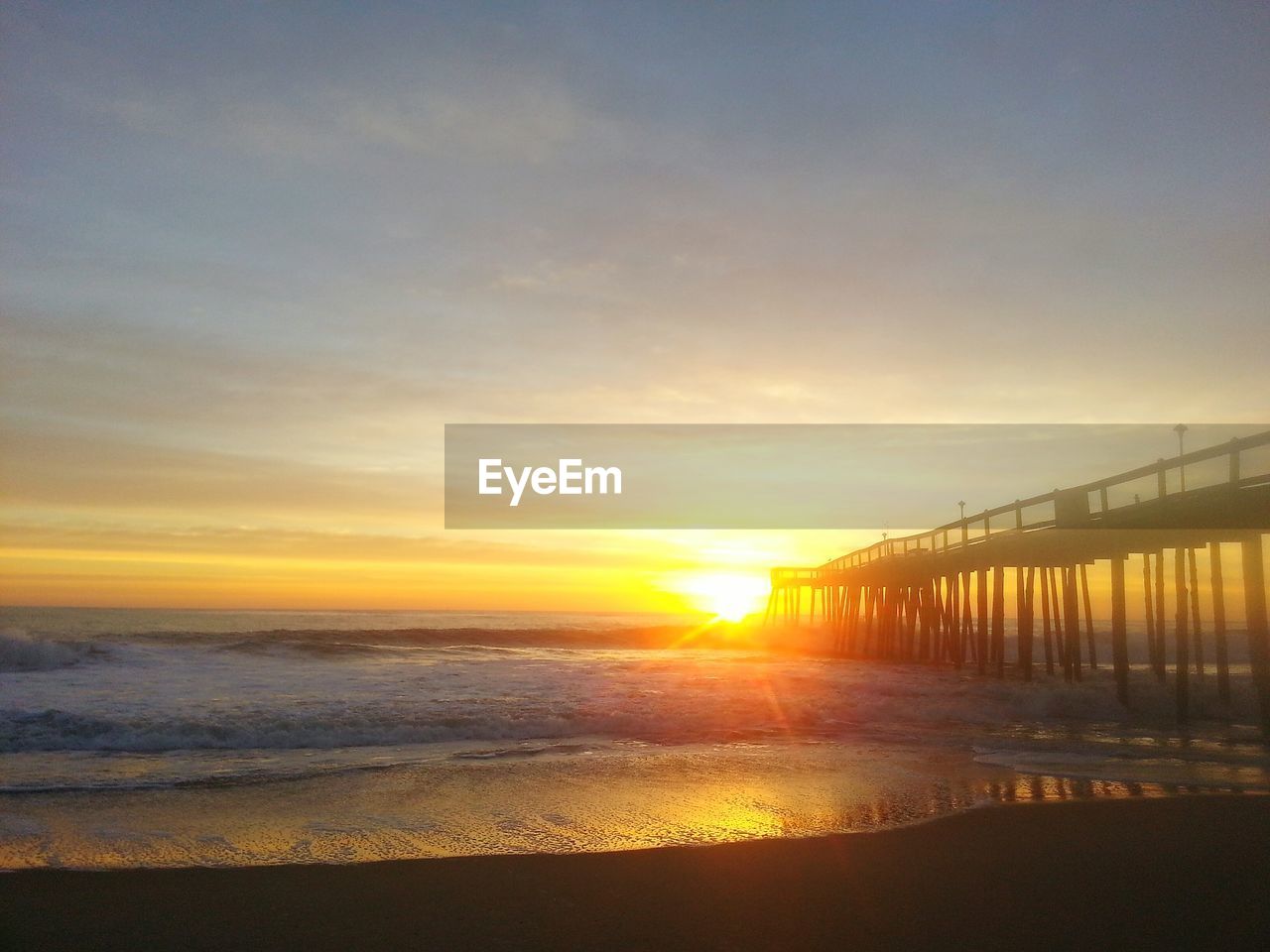 Scenic view of sunset over sea