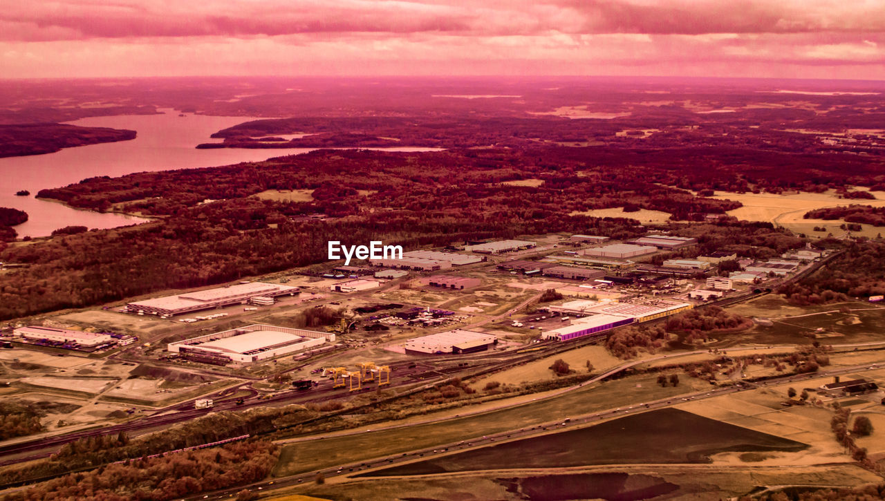 Aerial view of landscape against sky during sunset