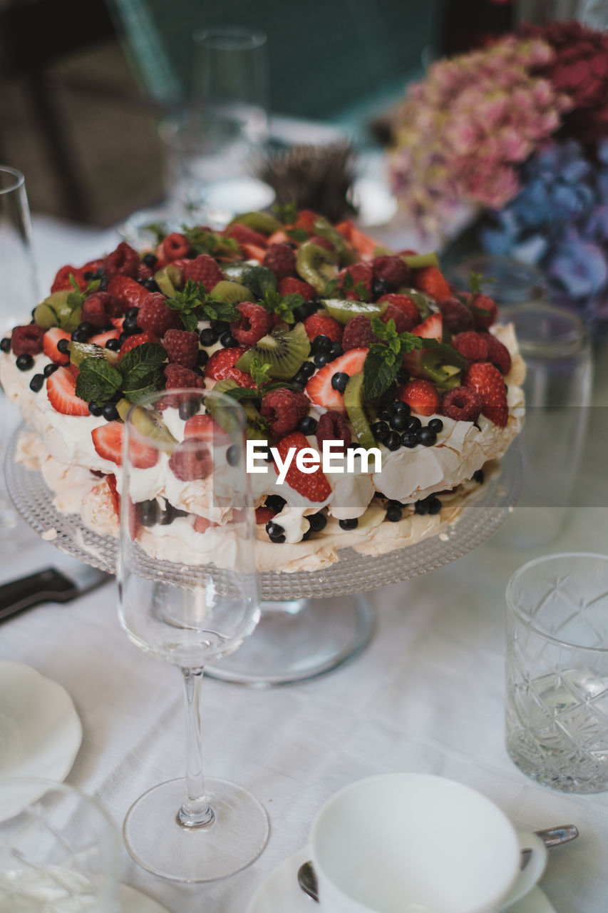 Close-up of fruit cake served on table
