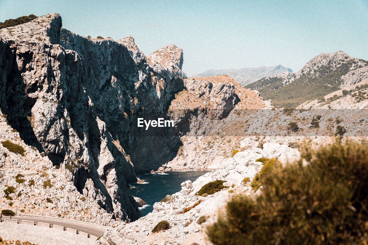 Scenic view of mountains against clear sky