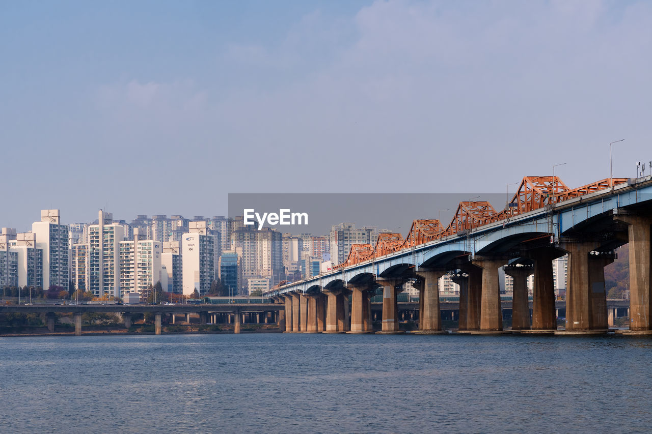 A wide picture of dongho bridge over the han river from the riverside