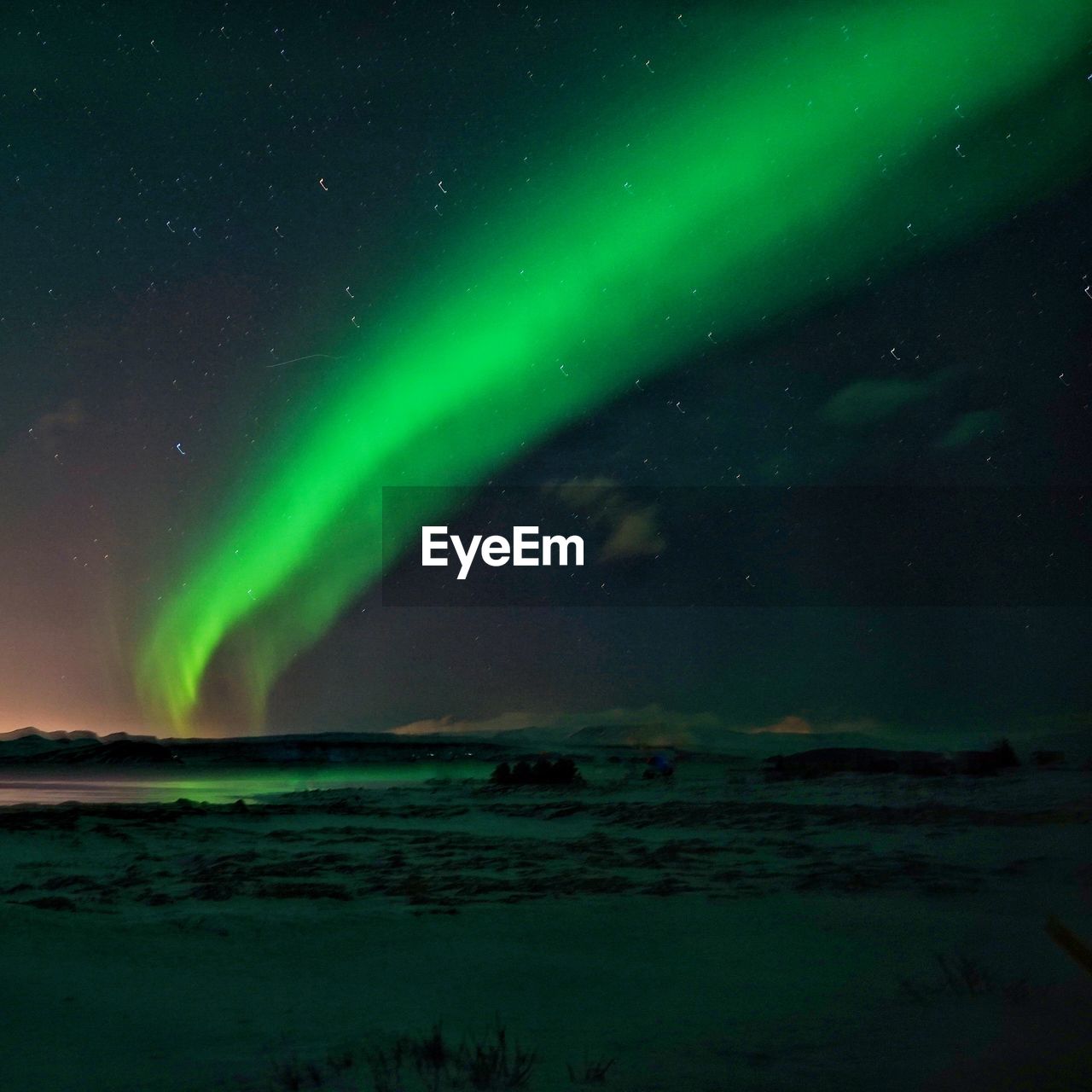 Scenic view of sea against sky at night