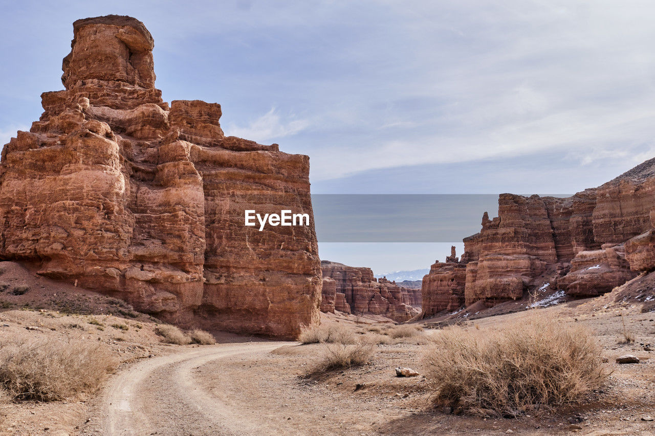 Road along valley of castles gorge, charyn canyon national nature park in kazakhstan.