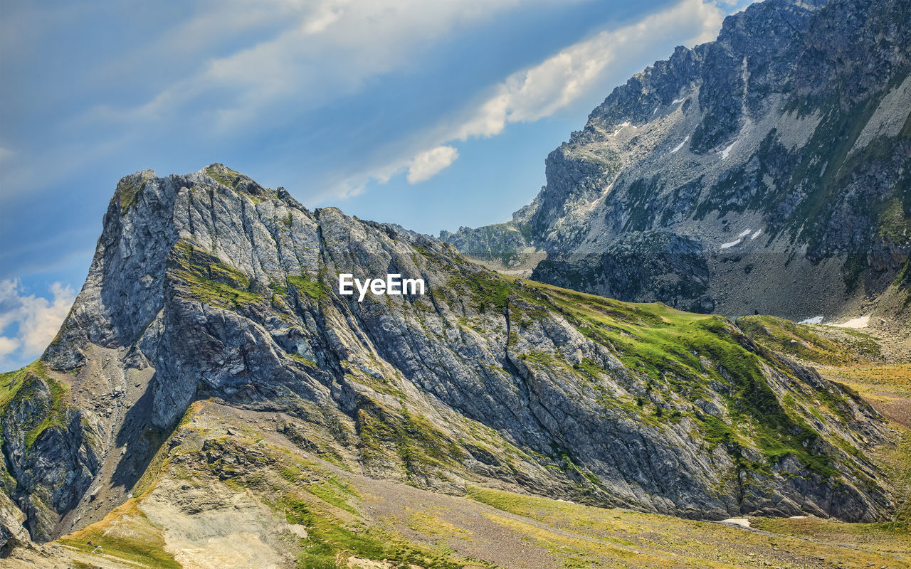 Scenic view of mountain range against sky