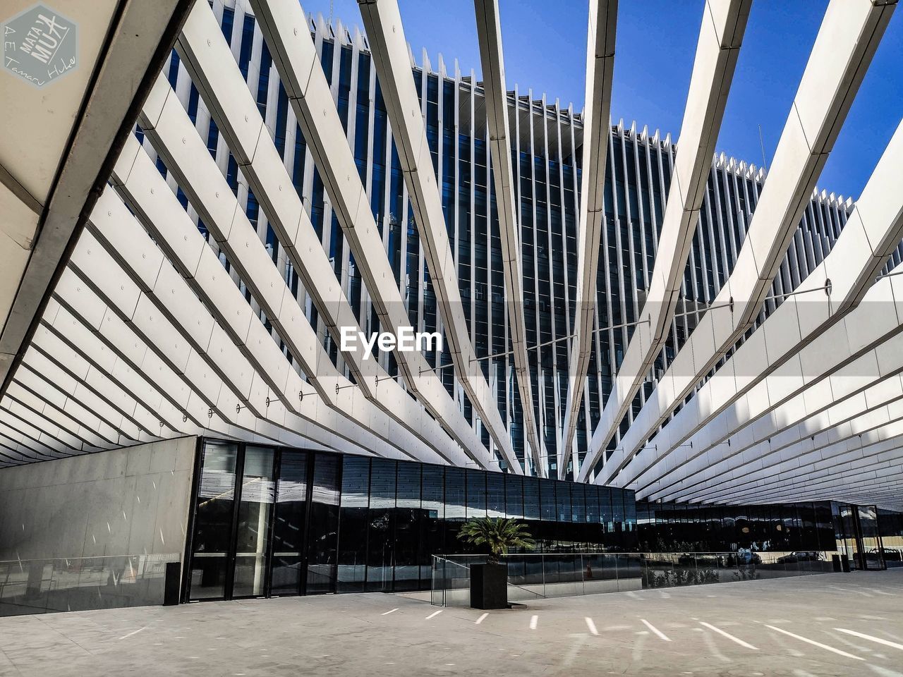 Low angle view of modern building against clear sky