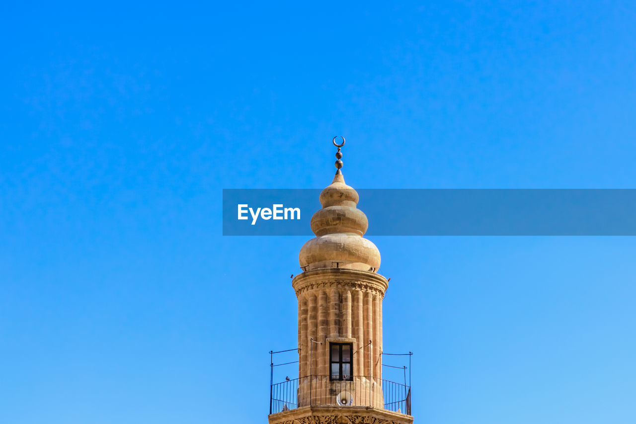 LOW ANGLE VIEW OF A TOWER