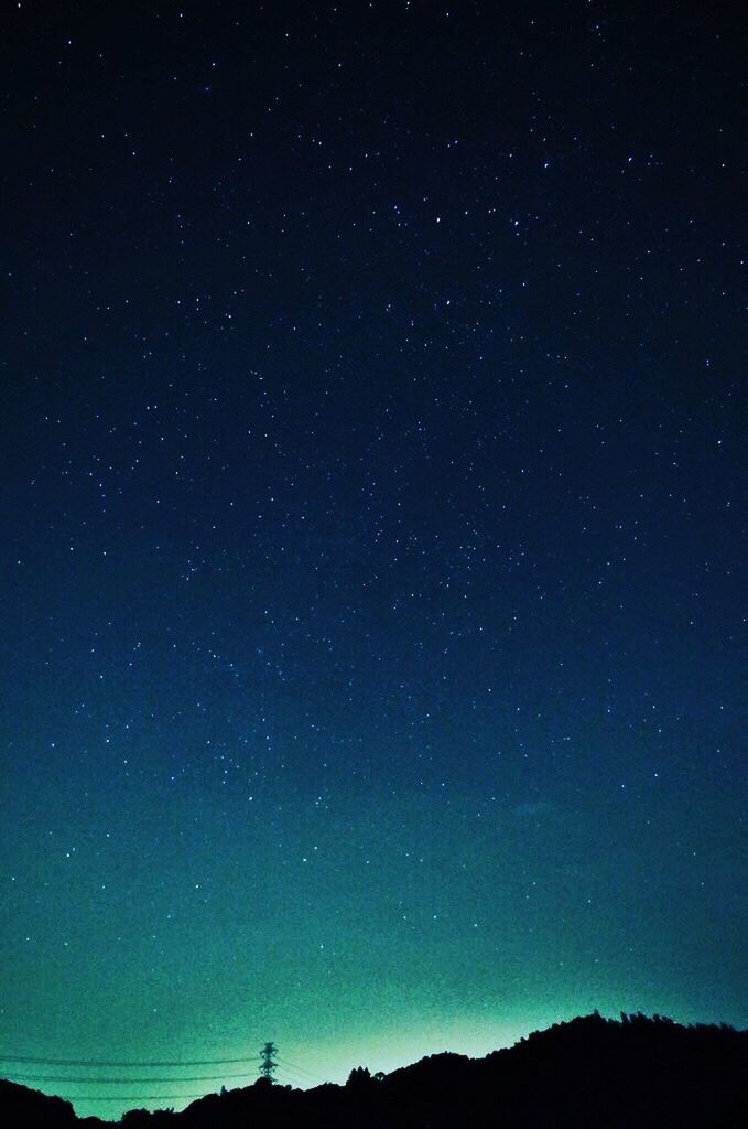 LOW ANGLE VIEW OF STARS IN SKY AT NIGHT