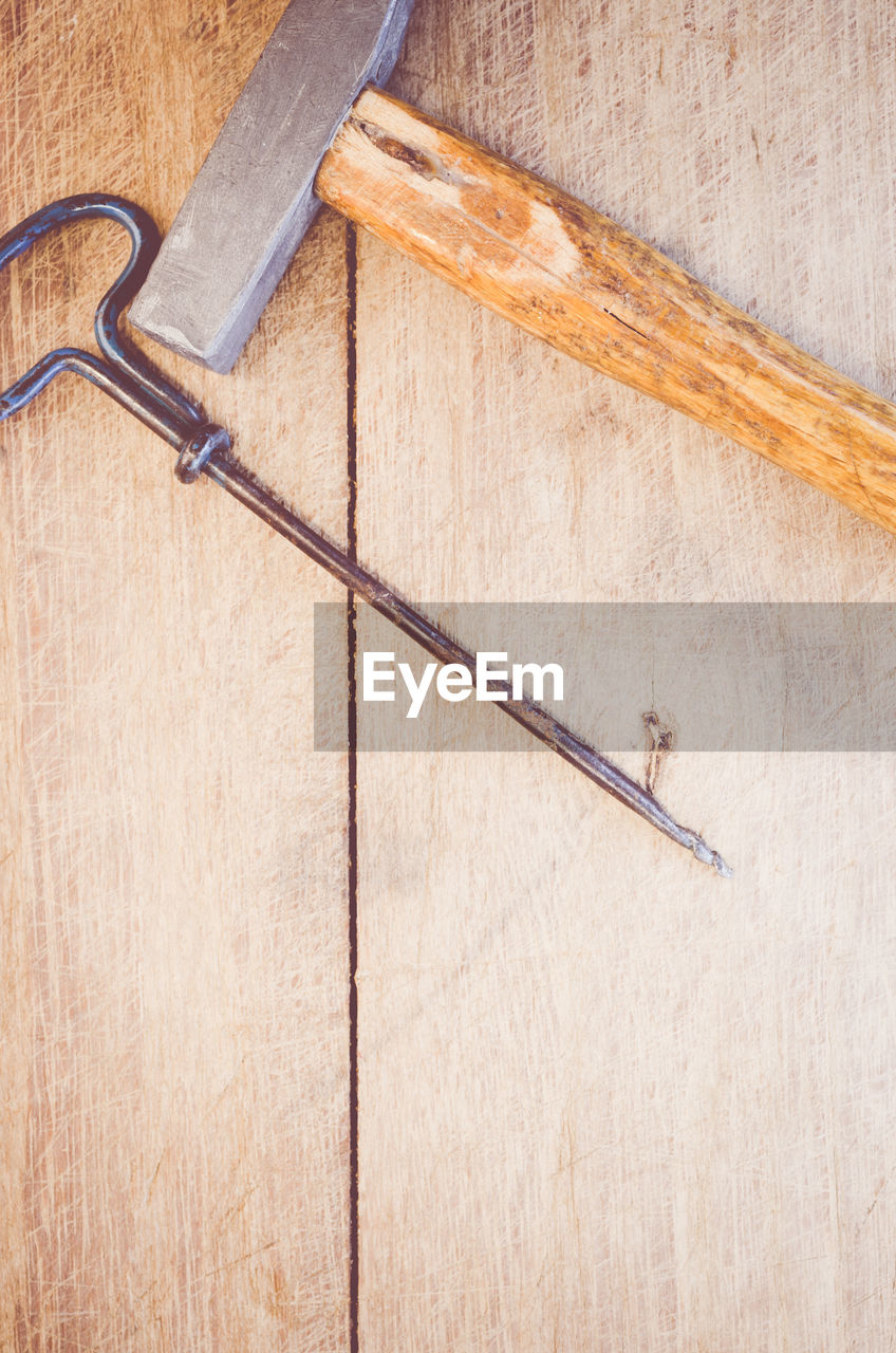 Old hand tools on wooden table