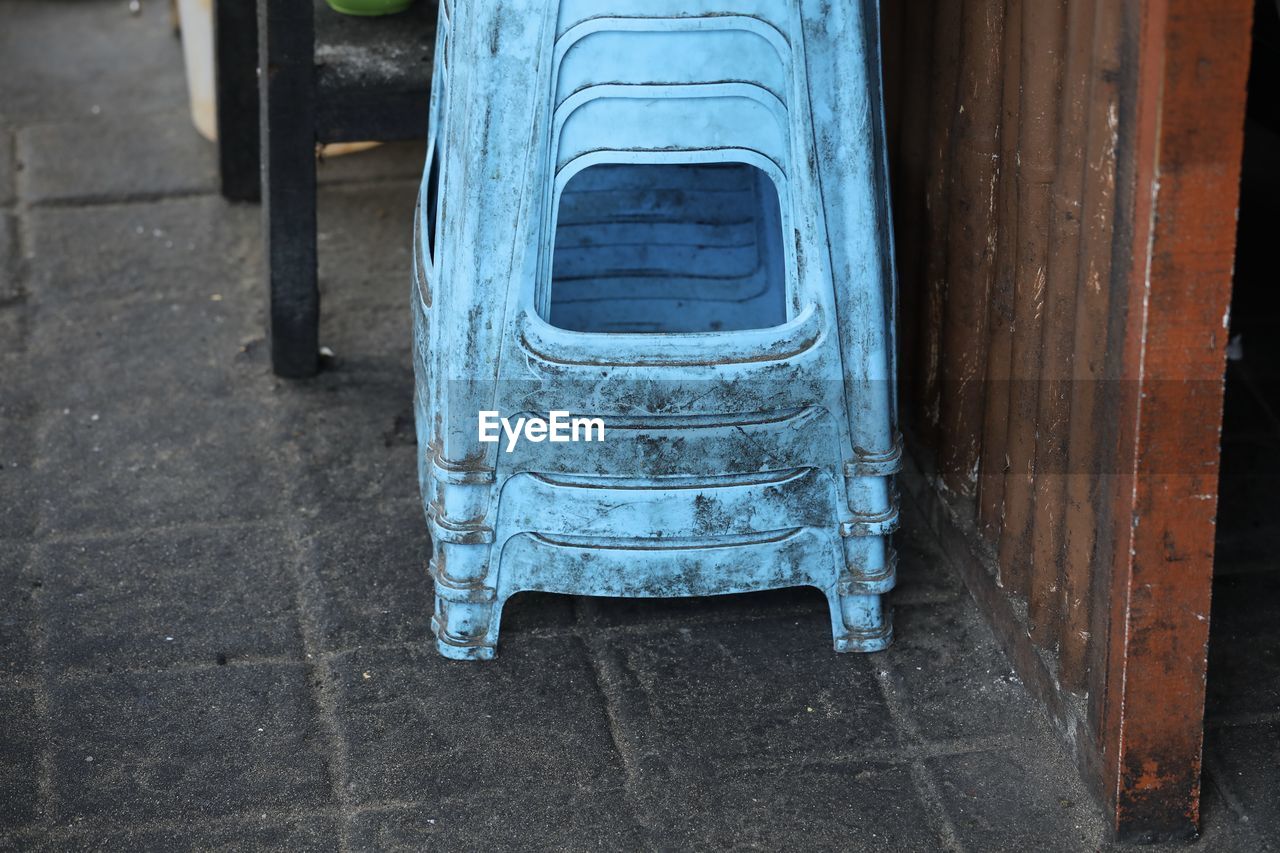 High angle view of blue chair in old building