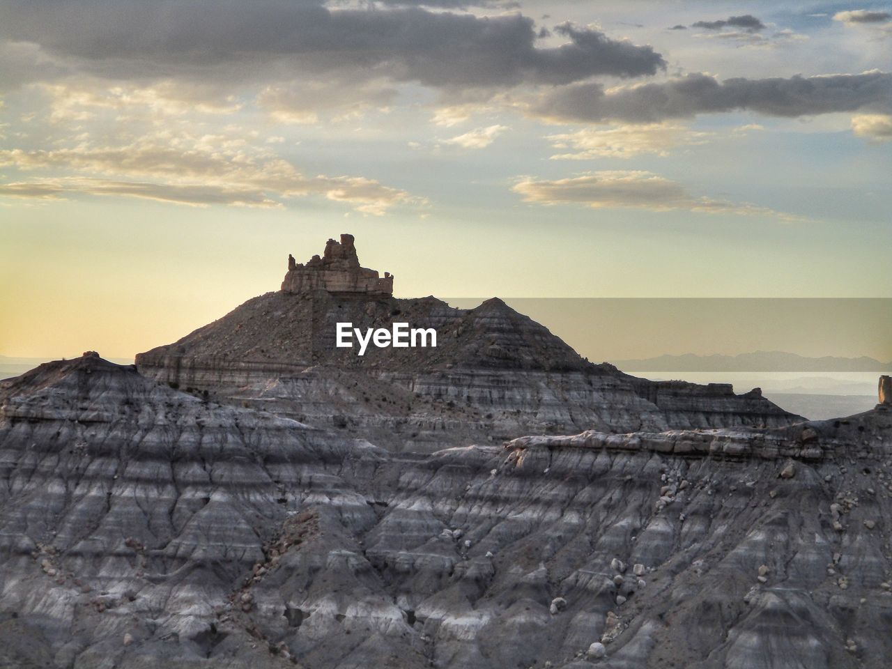 CASTLE ON MOUNTAIN AGAINST SKY