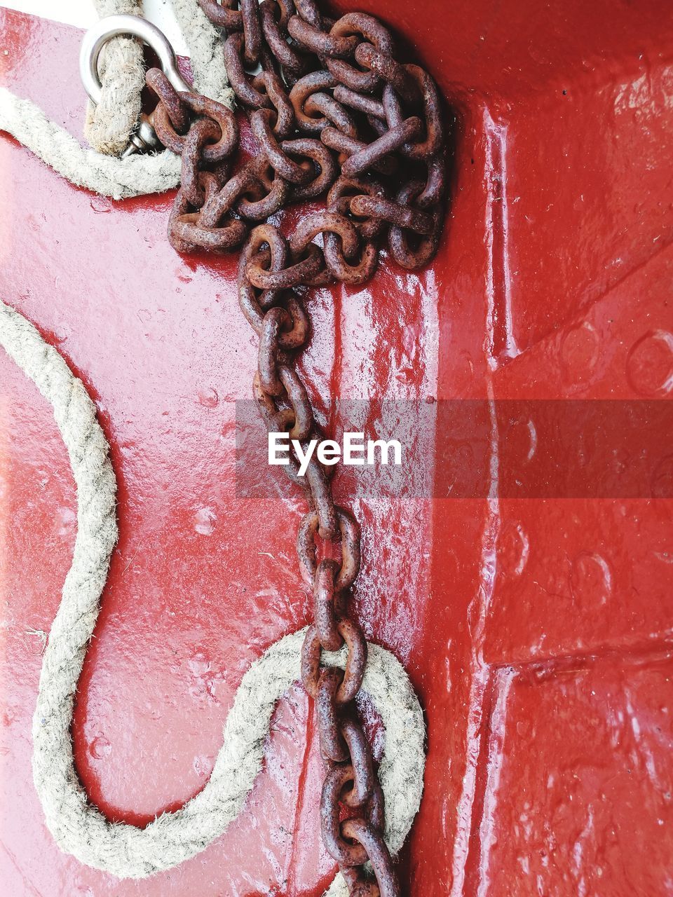 Close-up of rope and metal chain