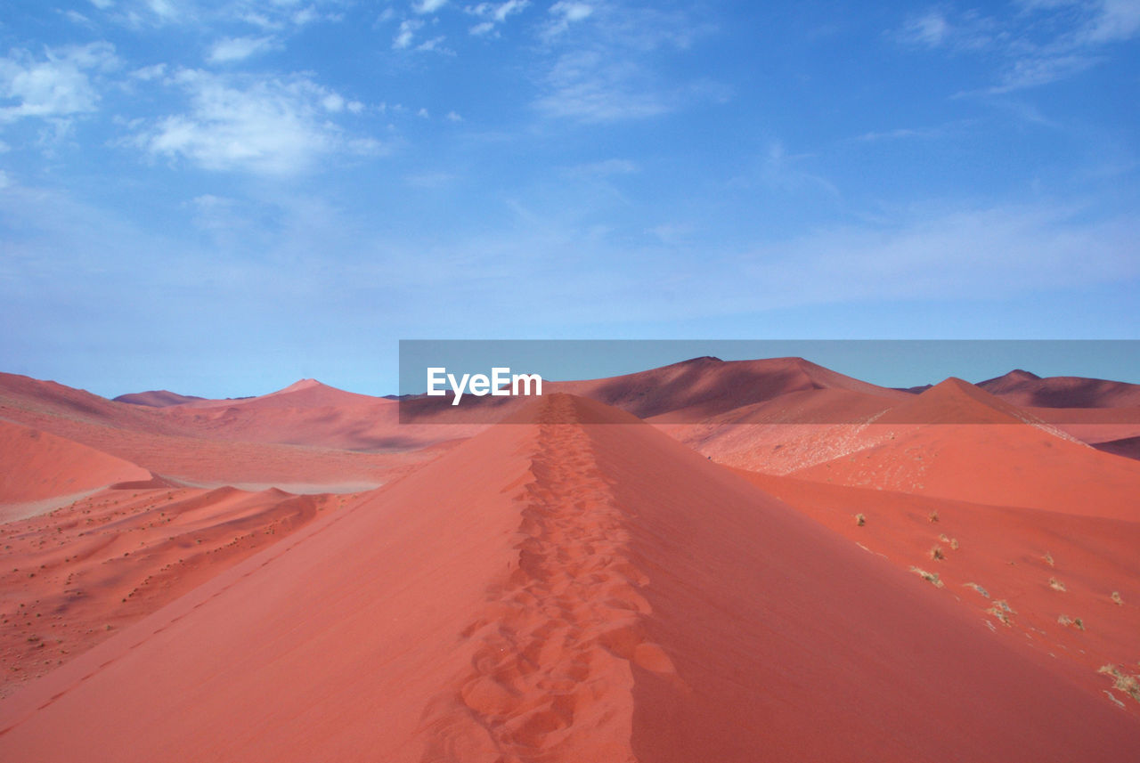 Scenic view of desert against sky