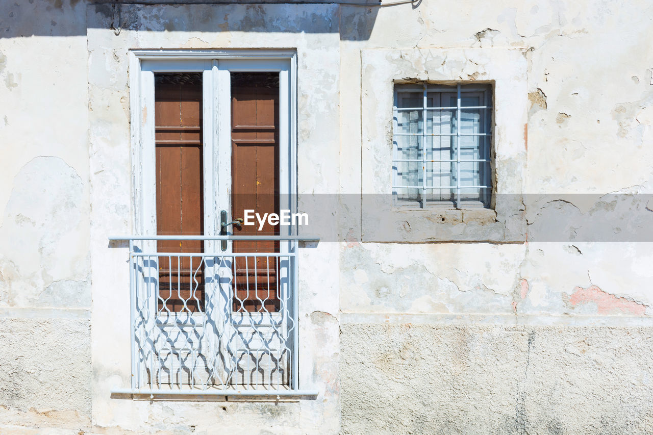 HOUSE SEEN THROUGH WINDOW