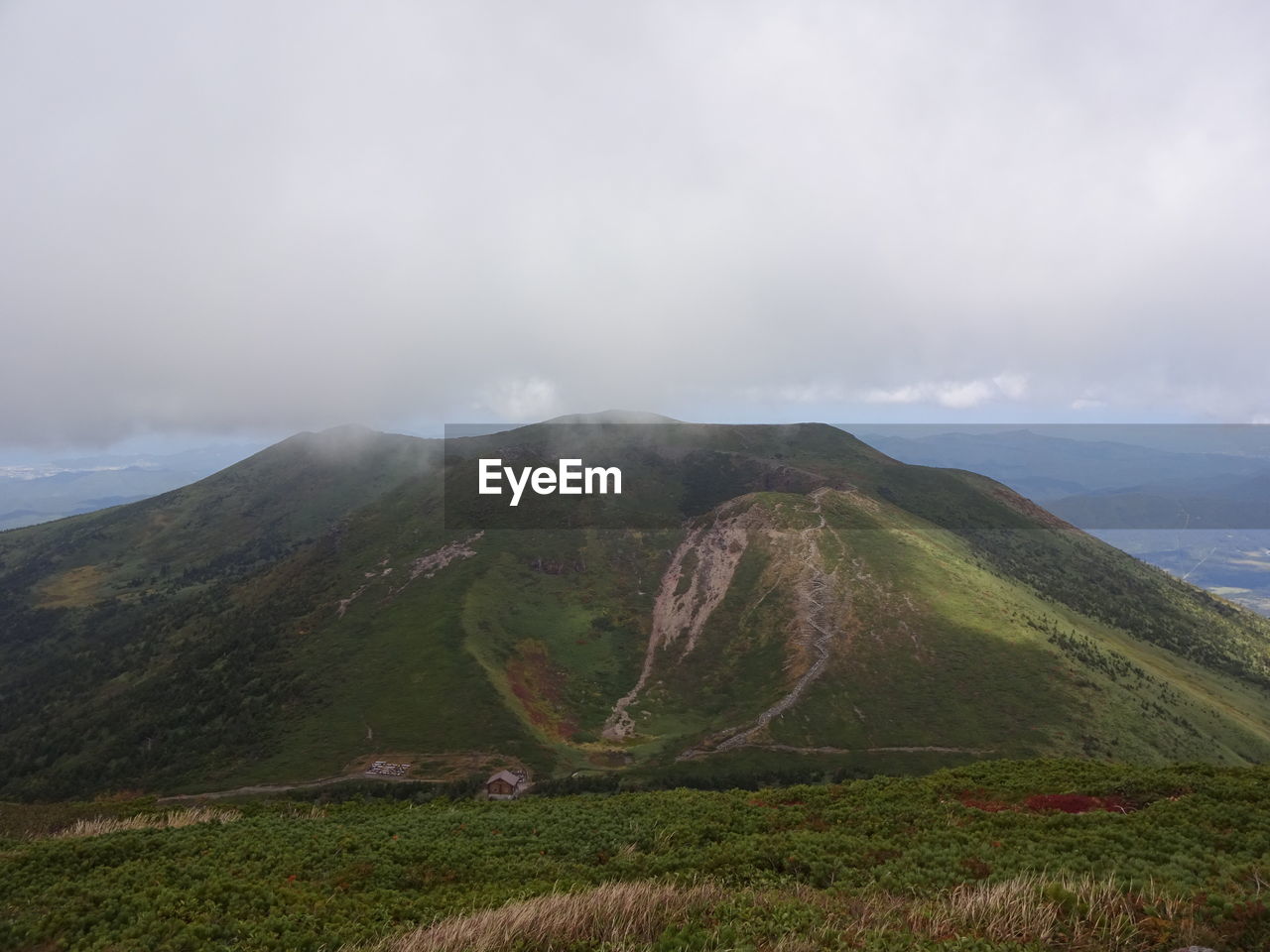 SCENIC VIEW OF MOUNTAIN AGAINST SKY