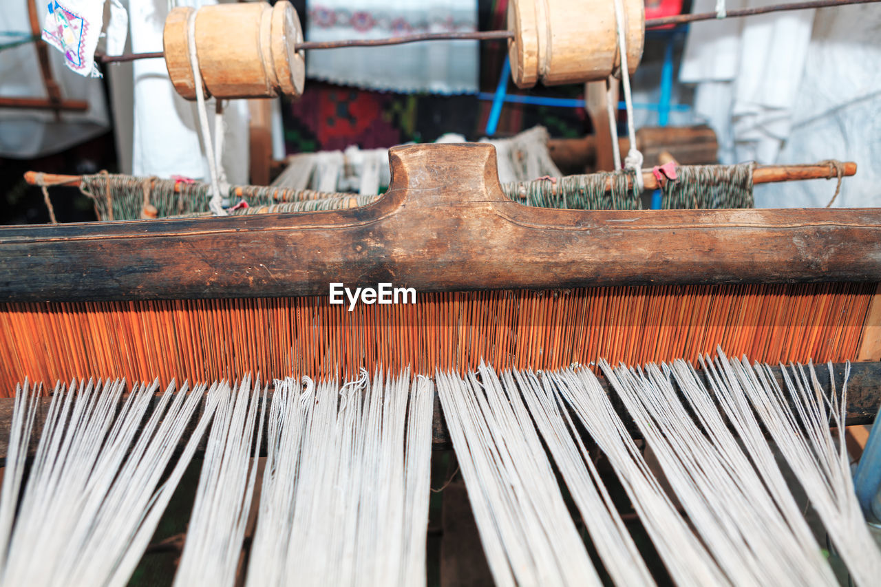 Ancient loom for making carpets . manufacturing of weaving cloth and tapestry