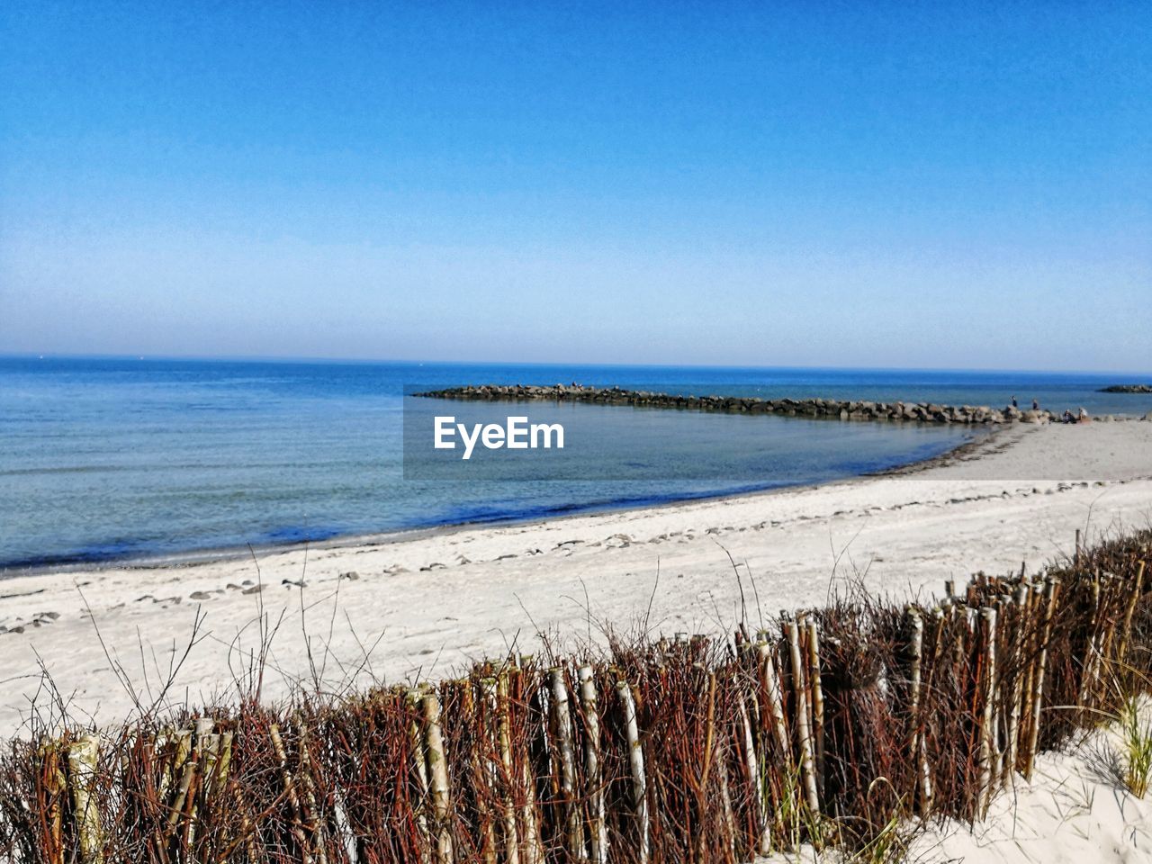 Scenic view of sea against clear sky