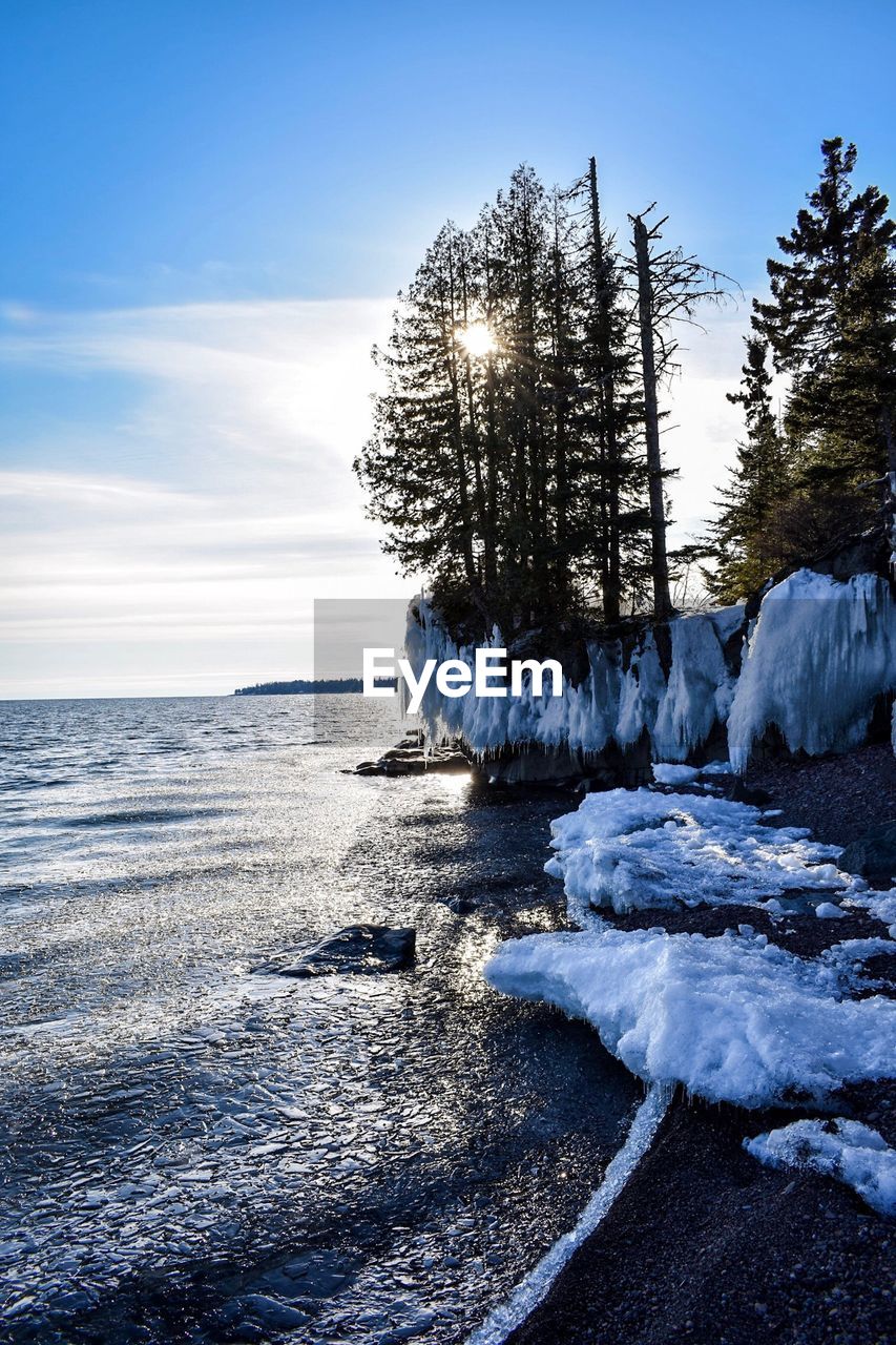 Scenic view of sea against sky during winter