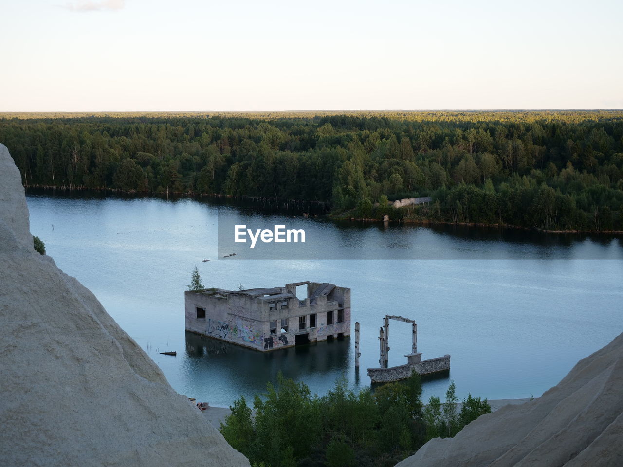 High angle view of dam by river against sky