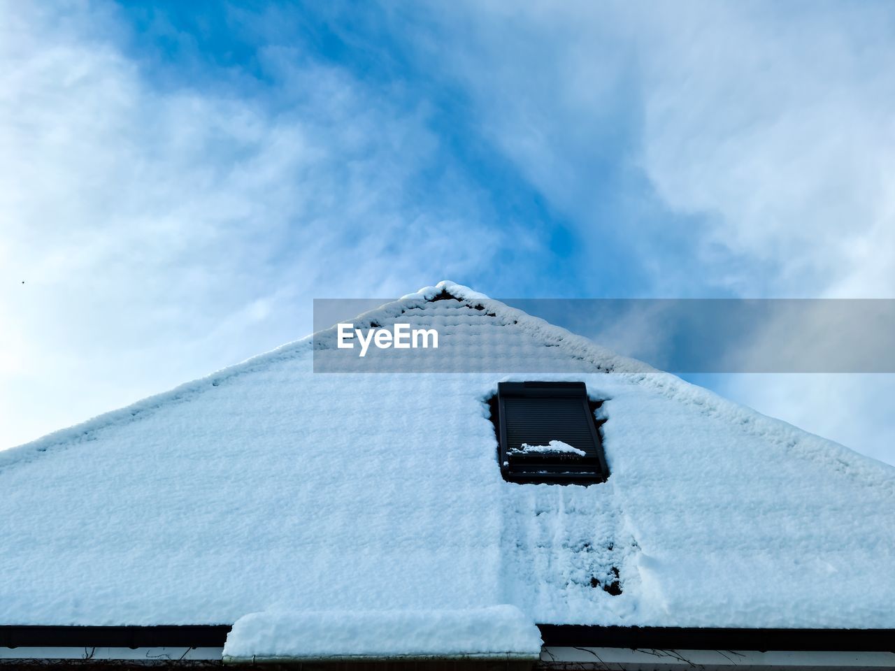 blue, sky, snow, architecture, built structure, cloud, building exterior, winter, nature, cold temperature, day, no people, white, roof, building, mountain, outdoors, low angle view, environment, travel destinations, house, travel