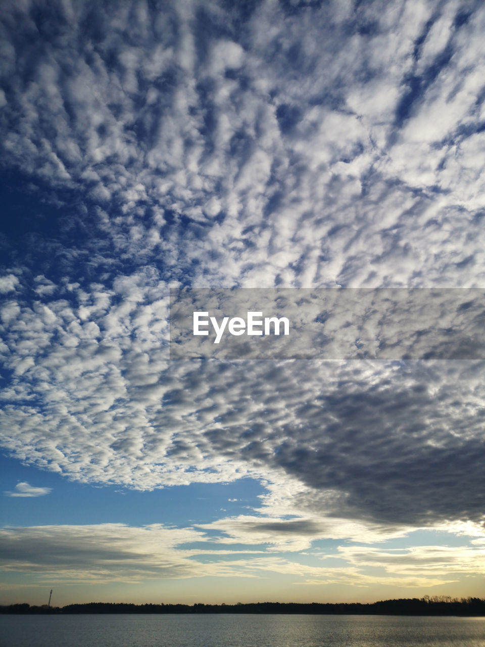 SCENIC VIEW OF CLOUDS OVER LAND