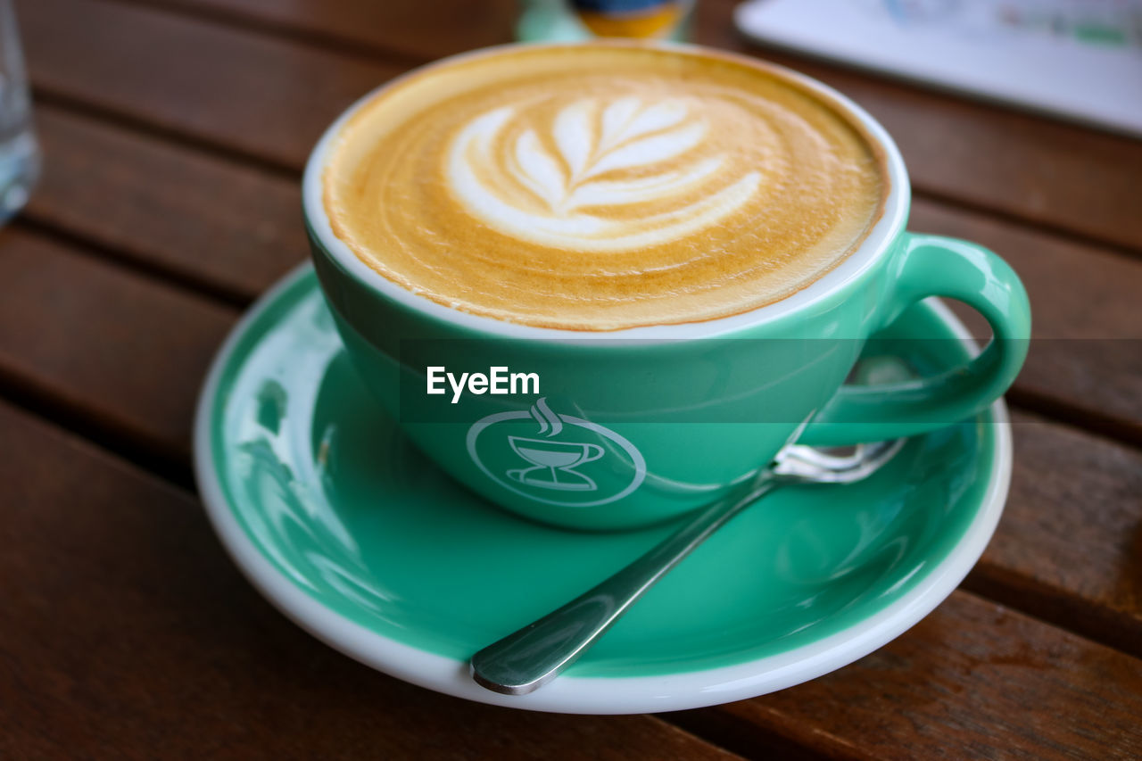 Close-up of cappuccino on table