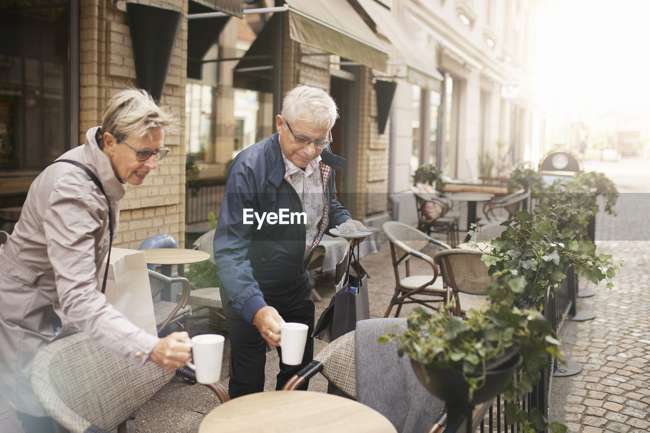 Mature couple having coffee