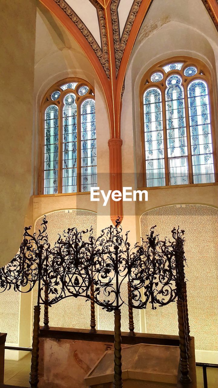 LOW ANGLE VIEW OF WINDOW IN CHURCH