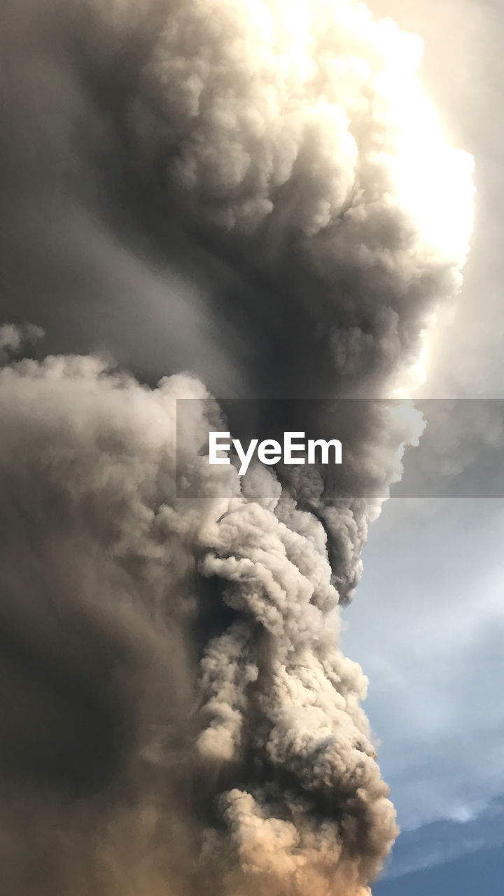 Plumes of ash and smoke from volcanic eruption