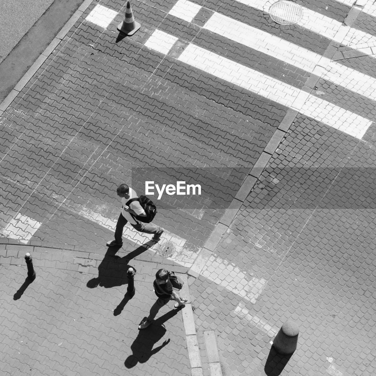 High angle view of people walking on street