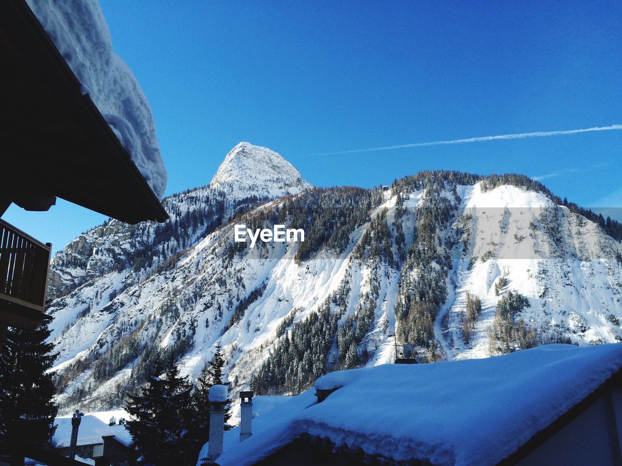 Scenic view of snow covered mountains