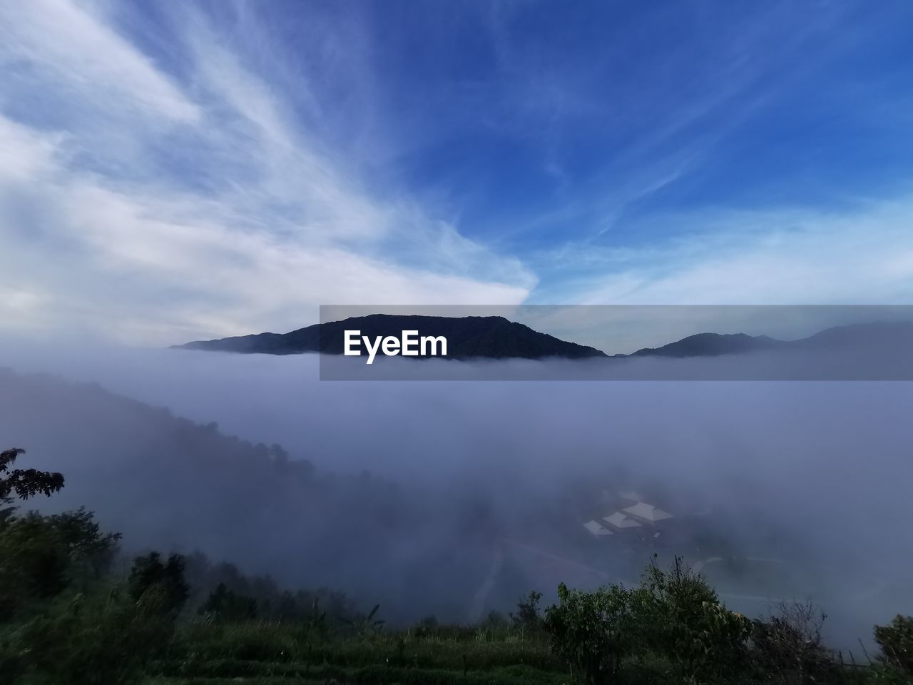 SCENIC VIEW OF LAND AND TREES AGAINST SKY