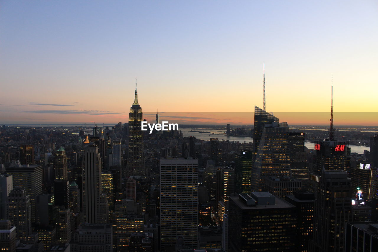 Aerial view of city at sunset