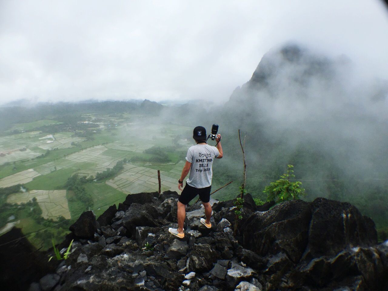 Man overlooking countryside landscape