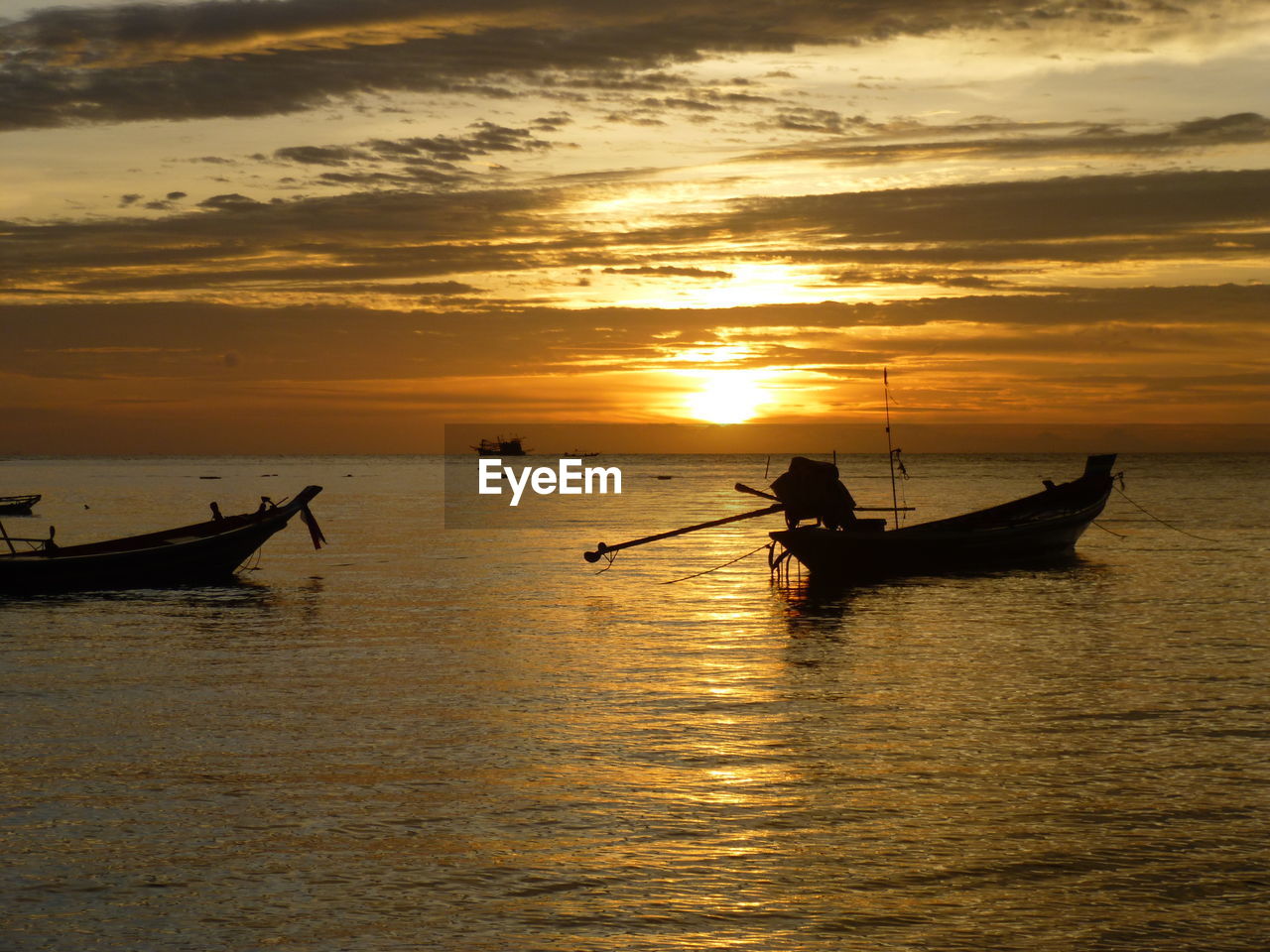 Scenic view of sea at sunset