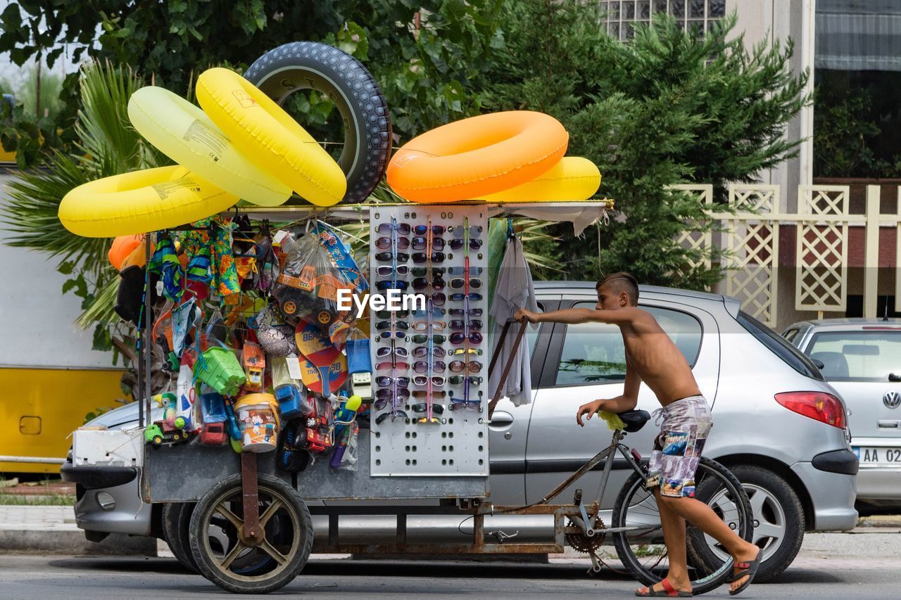 MAN CYCLING ON BICYCLE