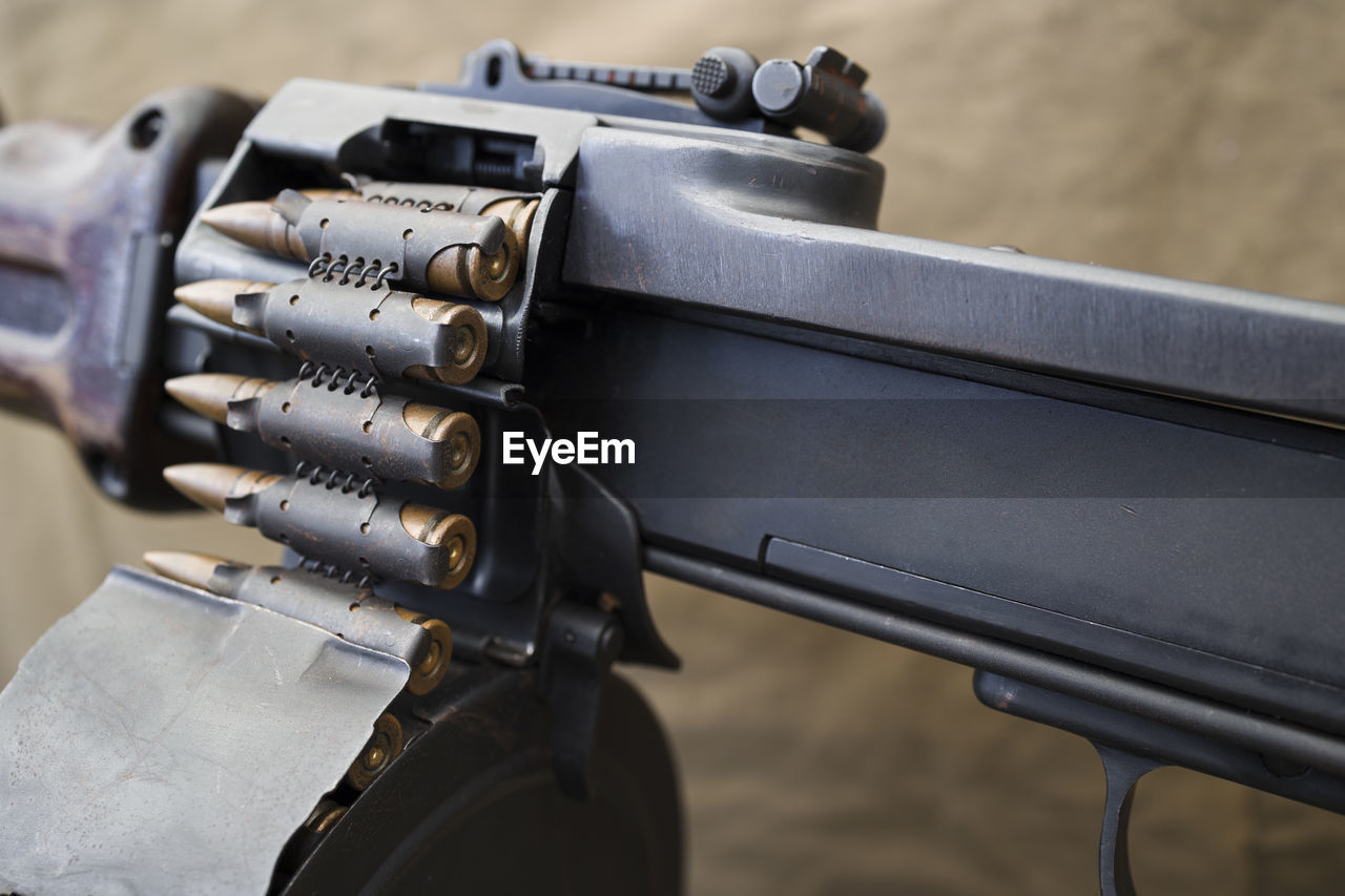 firearm, gun, weapon, rifle, assault rifle, gun barrel, machine gun, handgun, close-up, no people, shotgun, focus on foreground