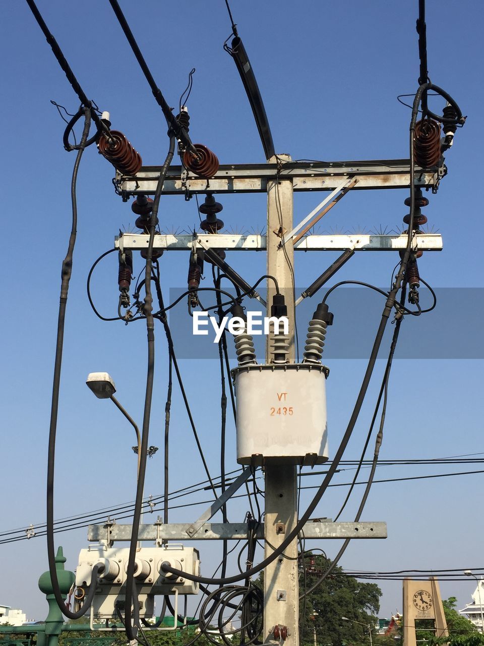 LOW ANGLE VIEW OF TELEPHONE POLE AGAINST SKY