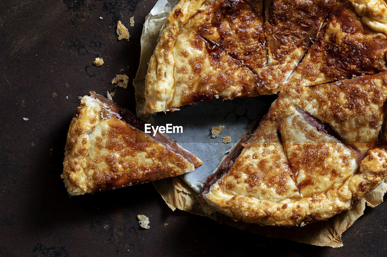 food, food and drink, dish, freshness, breakfast, meal, still life, high angle view, baked, no people, indoors, produce, dessert, healthy eating, bread, close-up, wellbeing, cuisine, directly above, slice, snack, sweet food